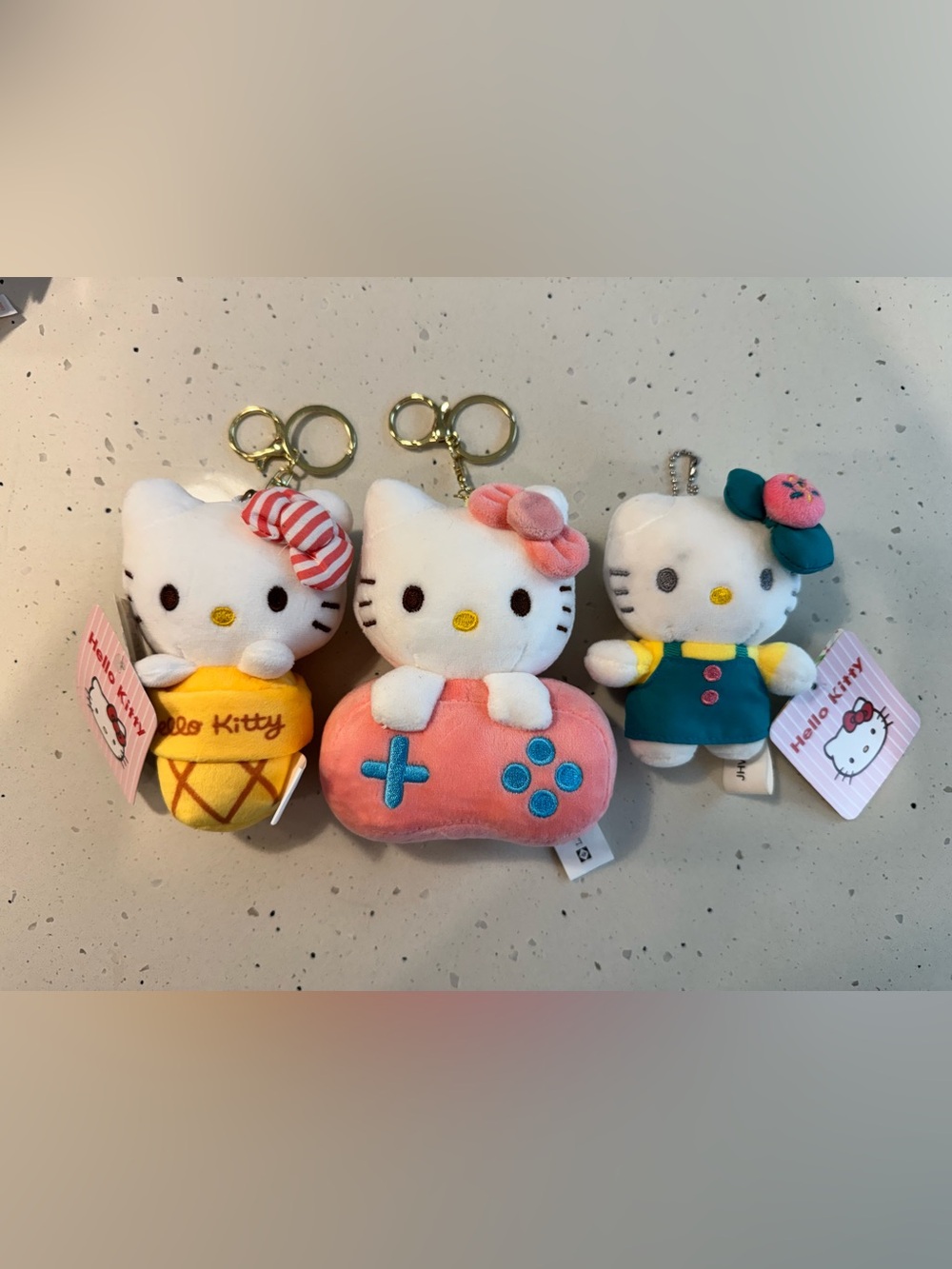 Hello Kitty Plush Keychain Trio — Pink, Yellow & Teal Accents